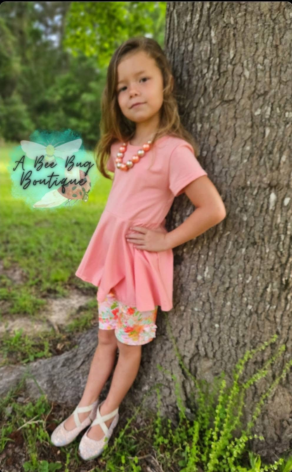 Peach Bow Back Peplum