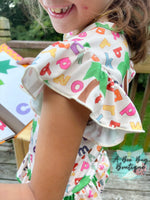 Load image into Gallery viewer, Alphabet Jungle Peplum Top
