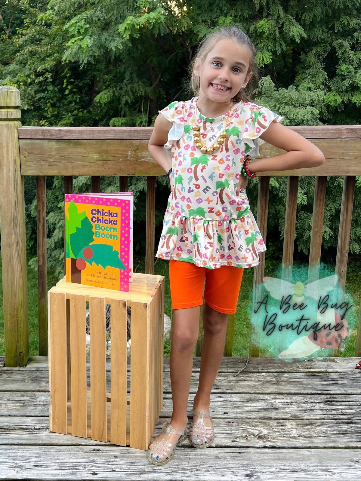 Alphabet Jungle Peplum Top