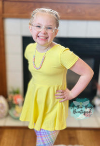 Yellow Bow Back Peplum