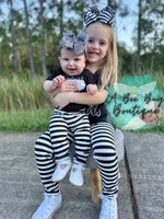 Load image into Gallery viewer, Black and white striped leggings
